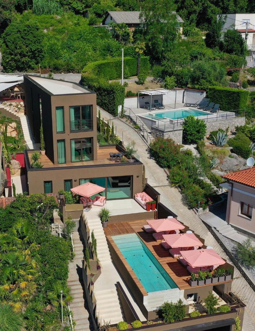 Aerial view of IBoutique Luxury Villa in Opatija with two pools, terraces and Mediterranean gardens