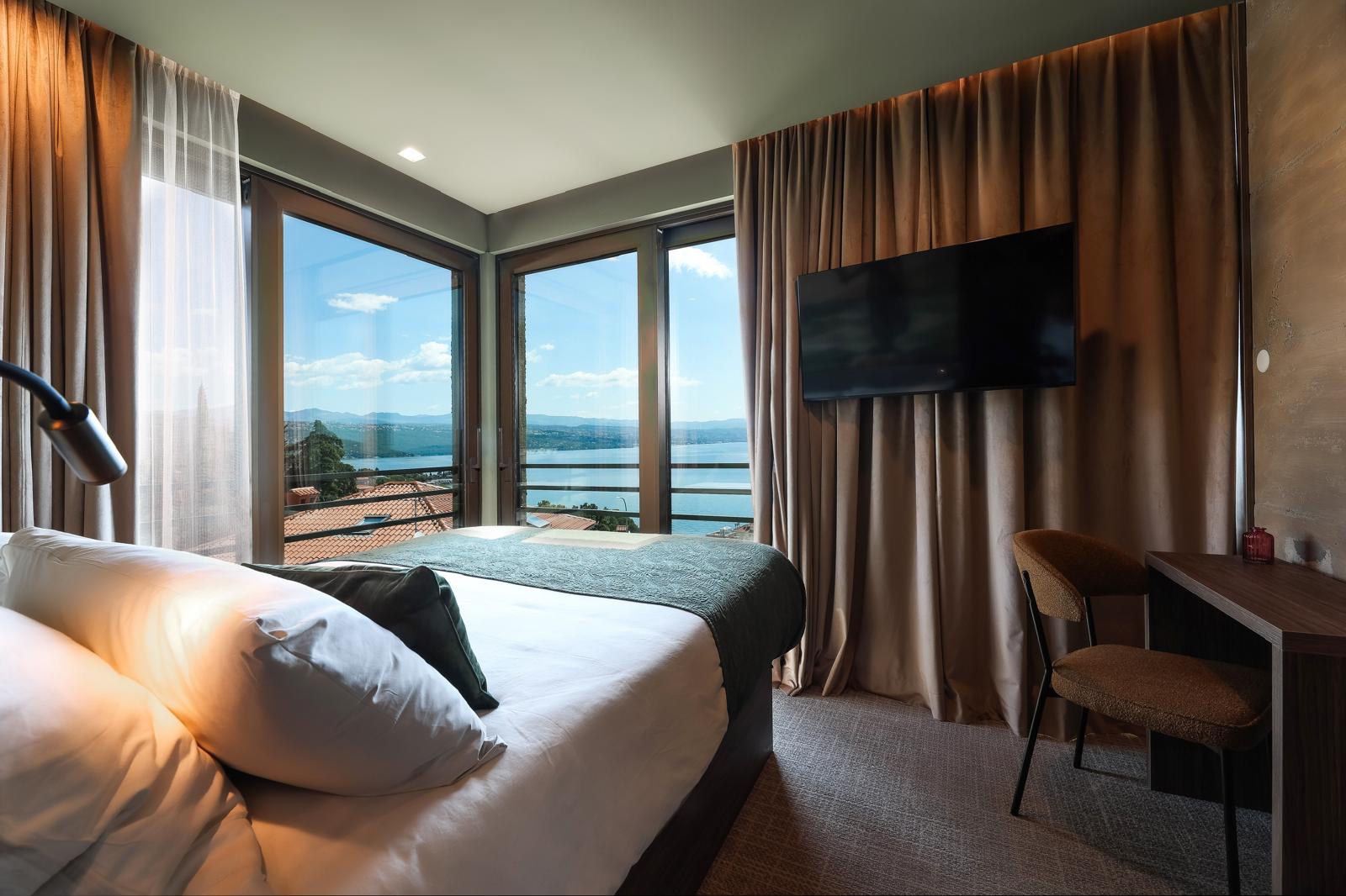 Bedroom with corner glazing and panoramic Kvarner Bay sea view near Rijeka, Croatia